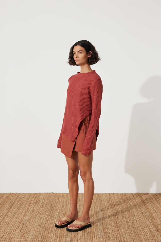 Paper Plane - Zulu & Zephyr - Wrap Skirt - Asymmetric Hem & tie Side - Clay Red - worn with Clay Knit Jumper